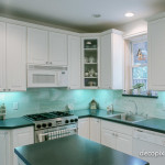 A modern kitchen with re-claimed Vitrolite tiles.